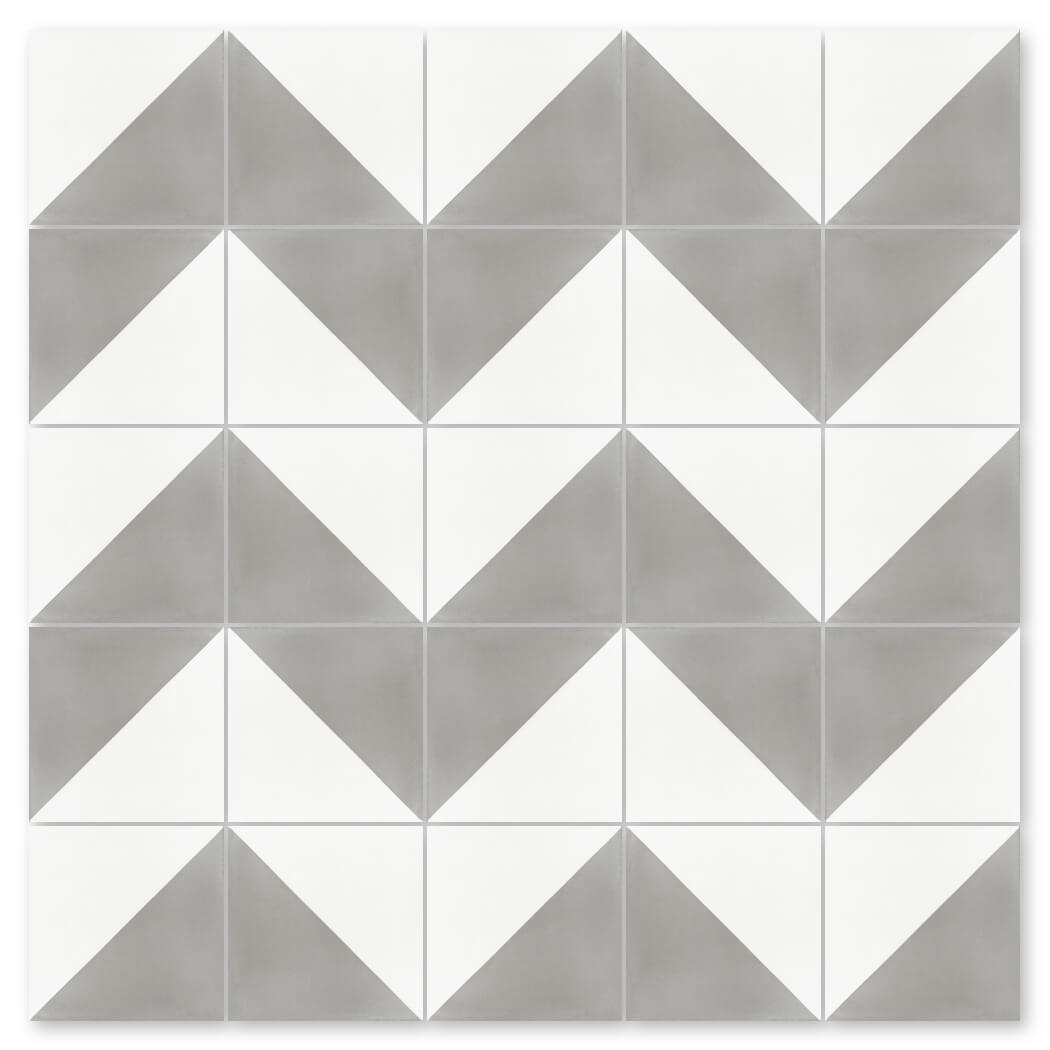 N20-139 Soft Slate & White by New York Cement Tile: Gray and white chevron triangles, inspired by handmade cement tiles.