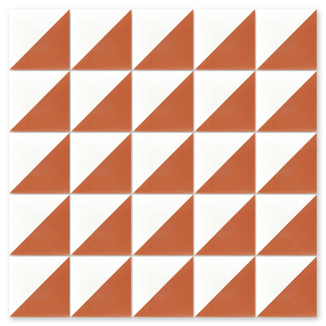 The N20-139 Terracotta & White tile by New York Cement Tile features a bold geometric split in terracotta and white.