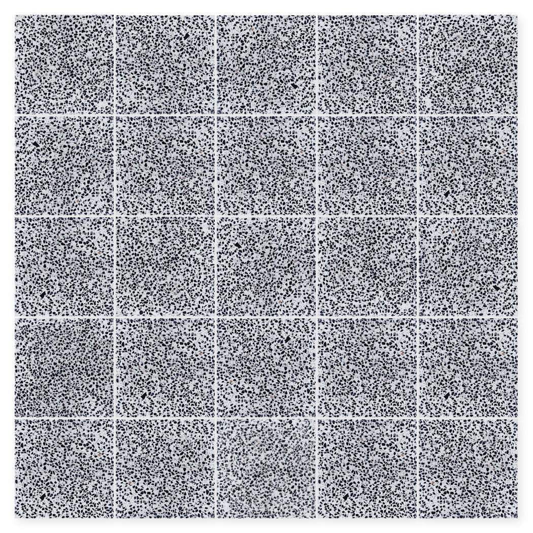 A sample of Terrazzo 12X12-NT30-Leopard by New York Cement Tile features dense black dots on white, like terrazzo tiles.