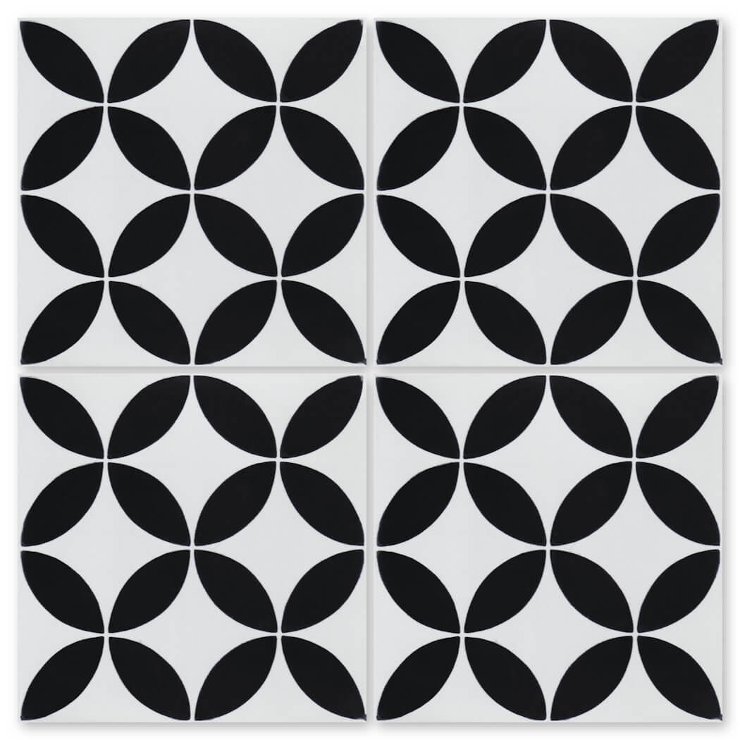 Black petal shapes form circles on four N20-061 White sample tiles by New York Cement Tile, arranged in a grid.
