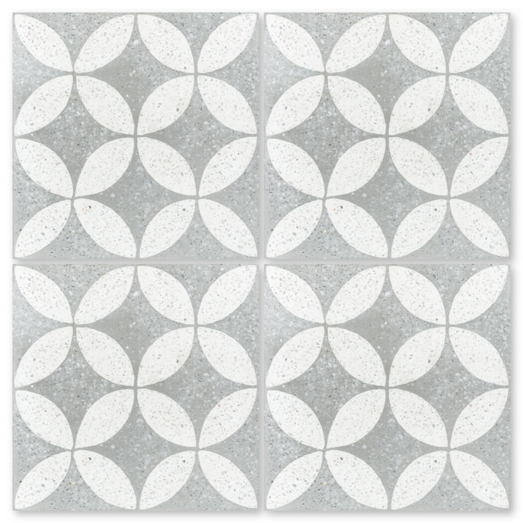 Four NT20-061 2219 tiles by New York Cement Tile form white petal mosaic designs at their intersections.
