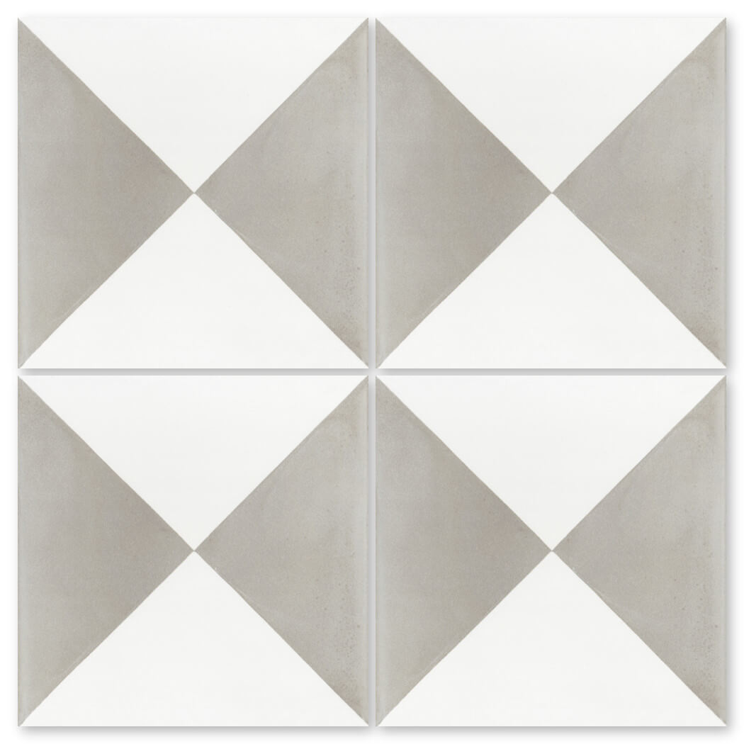 Sample of New York Cement Tile’s N20-032 Grey & White: geometric hourglass pattern in gray and white triangles.