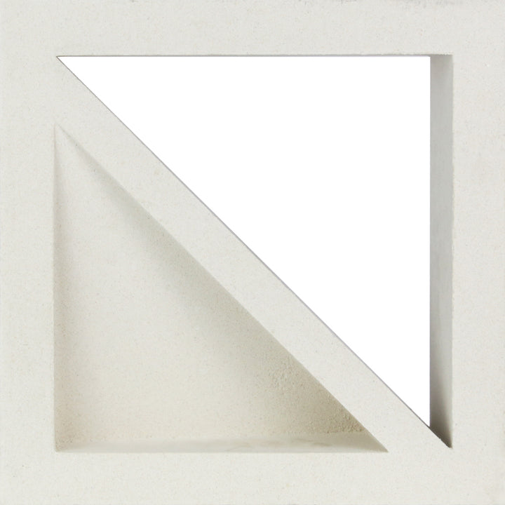 Large Bermy Sample by New York Cement Tile: a white breeze block with diagonal cut, creating a triangular decorative opening.