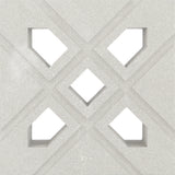 Lana by New York Cement Tile features a white textured surface with X and diamond cutouts inspired by mid-century breeze blocks.