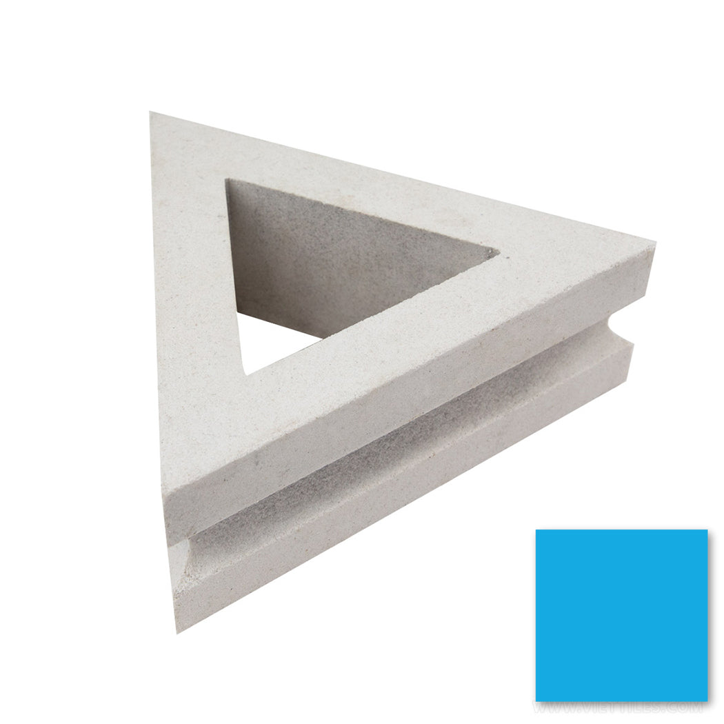 The Nui Triangular by New York Cement Tile, a white triangular breeze block, is shown beside a blue square swatch.