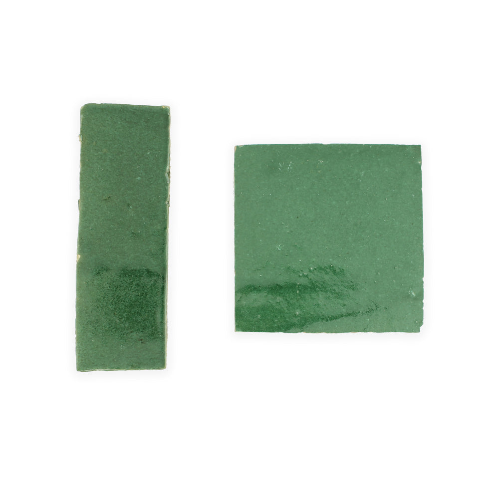 Two Forest Green (2x6) tiles by New York Cement Tile, rectangular and square, side by side on a white background.