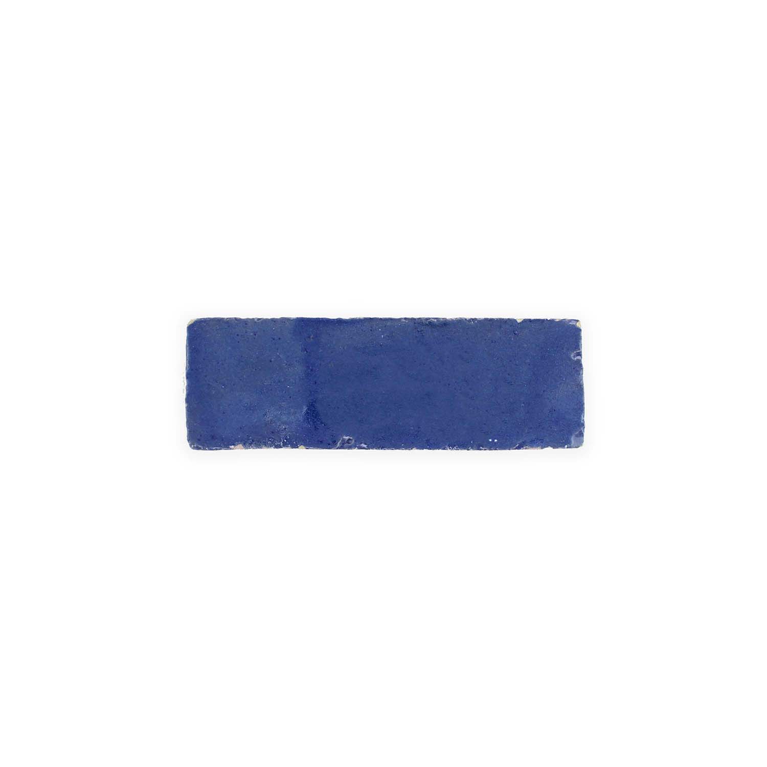 A single Navy Depths (2x6) tile by New York Cement Tile, rectangular, blue, handcrafted, on a white background.