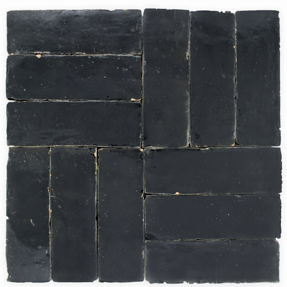 Black Onyx (2x6) by New York Cement Tile: black clay tiles in a striking square grid with alternating directions.