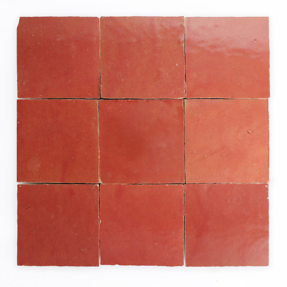 Nine Fiery Red Zellige tiles by New York Cement Tile are arranged in a 3x3 grid on a white background.