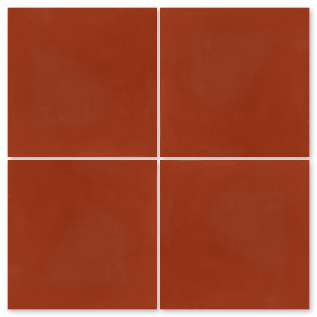 Four solid, square 5503-Solid tiles by New York Cement Tile in a 2x2 grid on a white background.