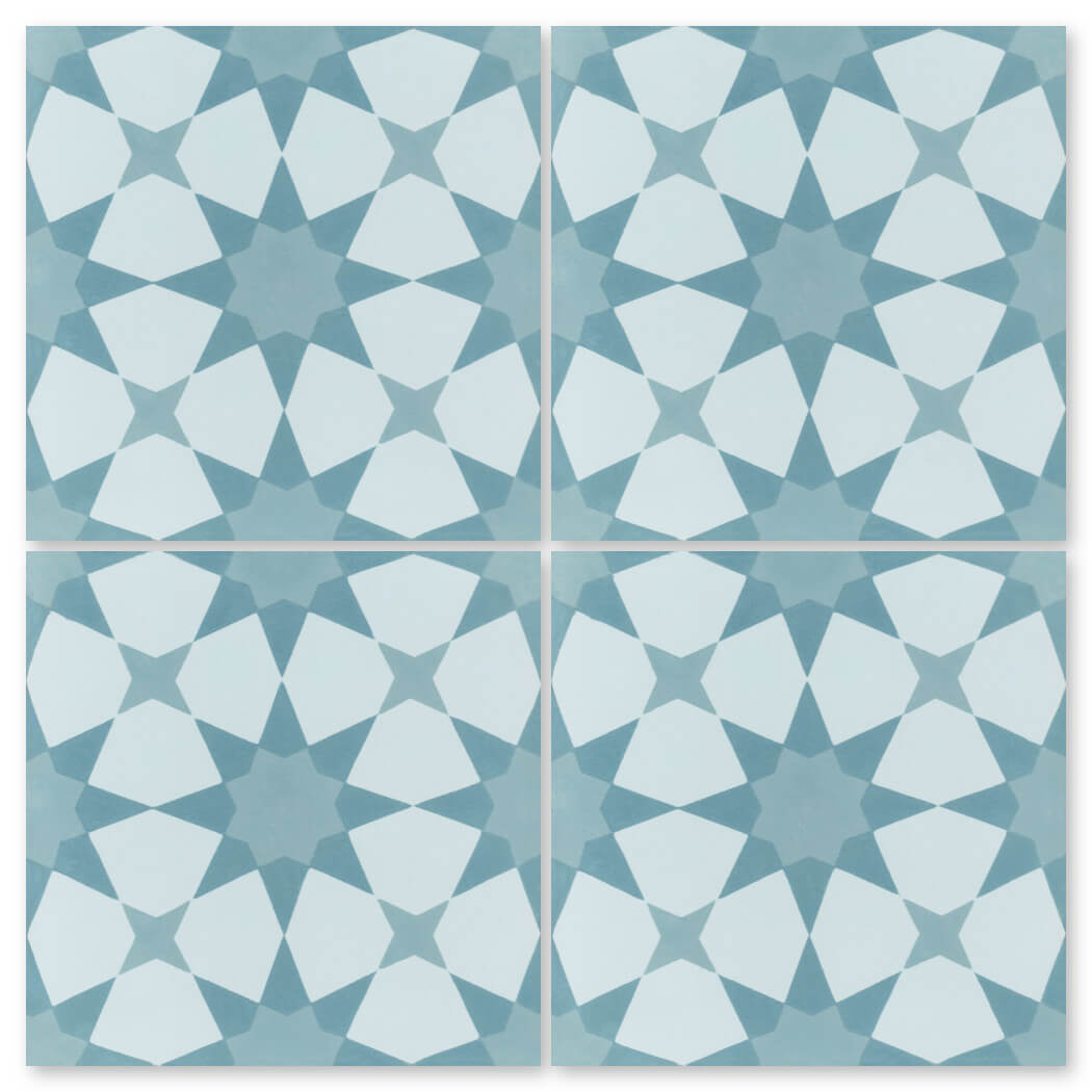 The N20-271 Blue sample by New York Cement Tile features a bold blue and white geometric star and pentagon pattern.