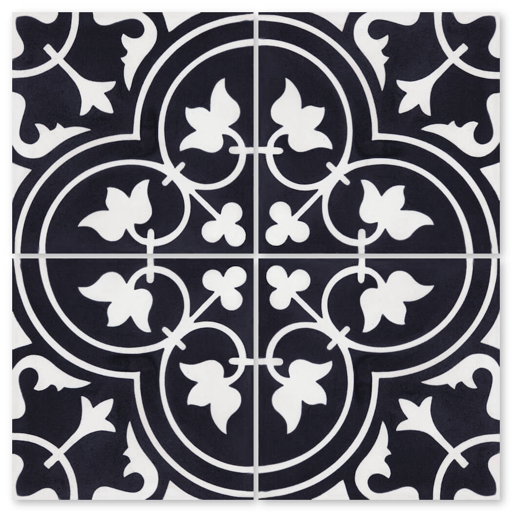 The N20-045 Black by New York Cement Tile features a bold black and white floral vine pattern across four squares.