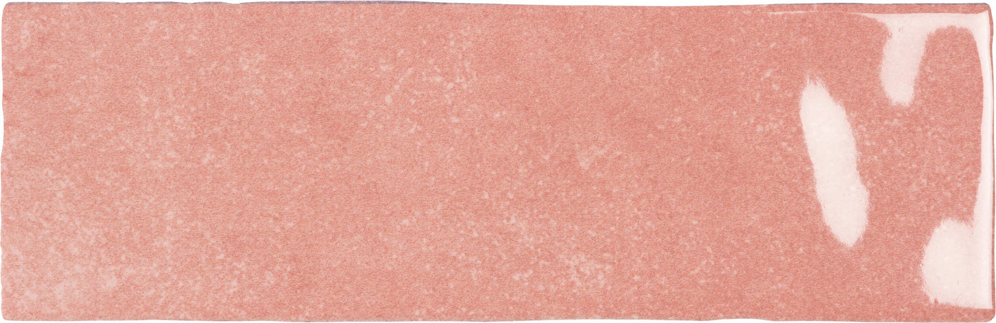 A single Rosa - Sample tile by New York Cement Tile on a white subway tile background.
