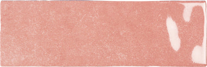 A single Rosa - Sample tile by New York Cement Tile on a white subway tile background.
