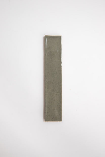 A single Skye Green tile sample by Cottage Ivy, rectangular and olive-green, on a plain white background.