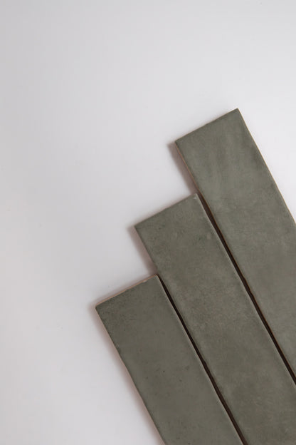 Three Skye Green rectangular tiles by Cottage Ivy are arranged diagonally on a white background.