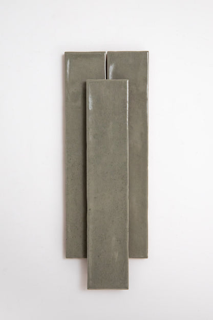 Three long, rectangular Skye Green tiles by Cottage Ivy are arranged vertically on a plain white background.