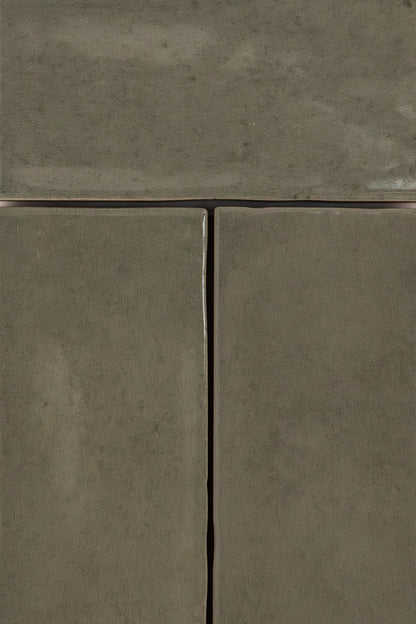 Three Skye Green tiles by Cottage Ivy with grout lines and a slightly textured surface. Extra sample.