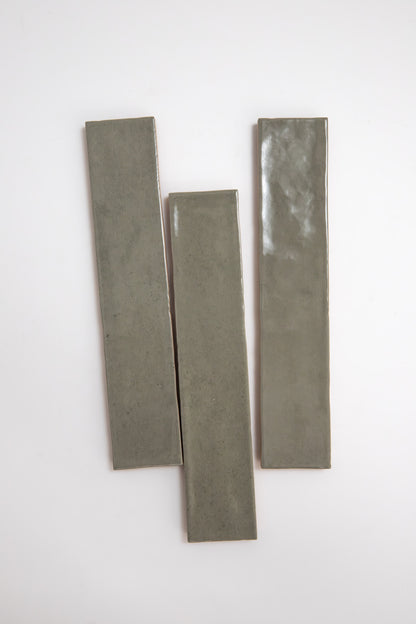 Three rectangular Skye Green ceramic tiles by Cottage Ivy are arranged vertically on a plain white background.