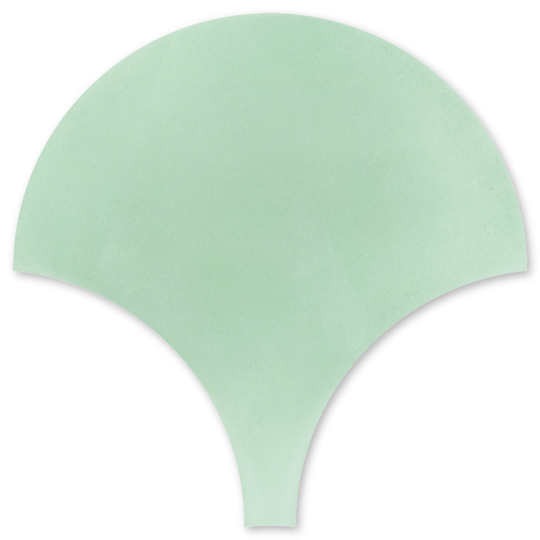 A flat, pale green NF20-3300-Mint Fishscale sample by New York Cement Tile, like a ginkgo leaf on white.