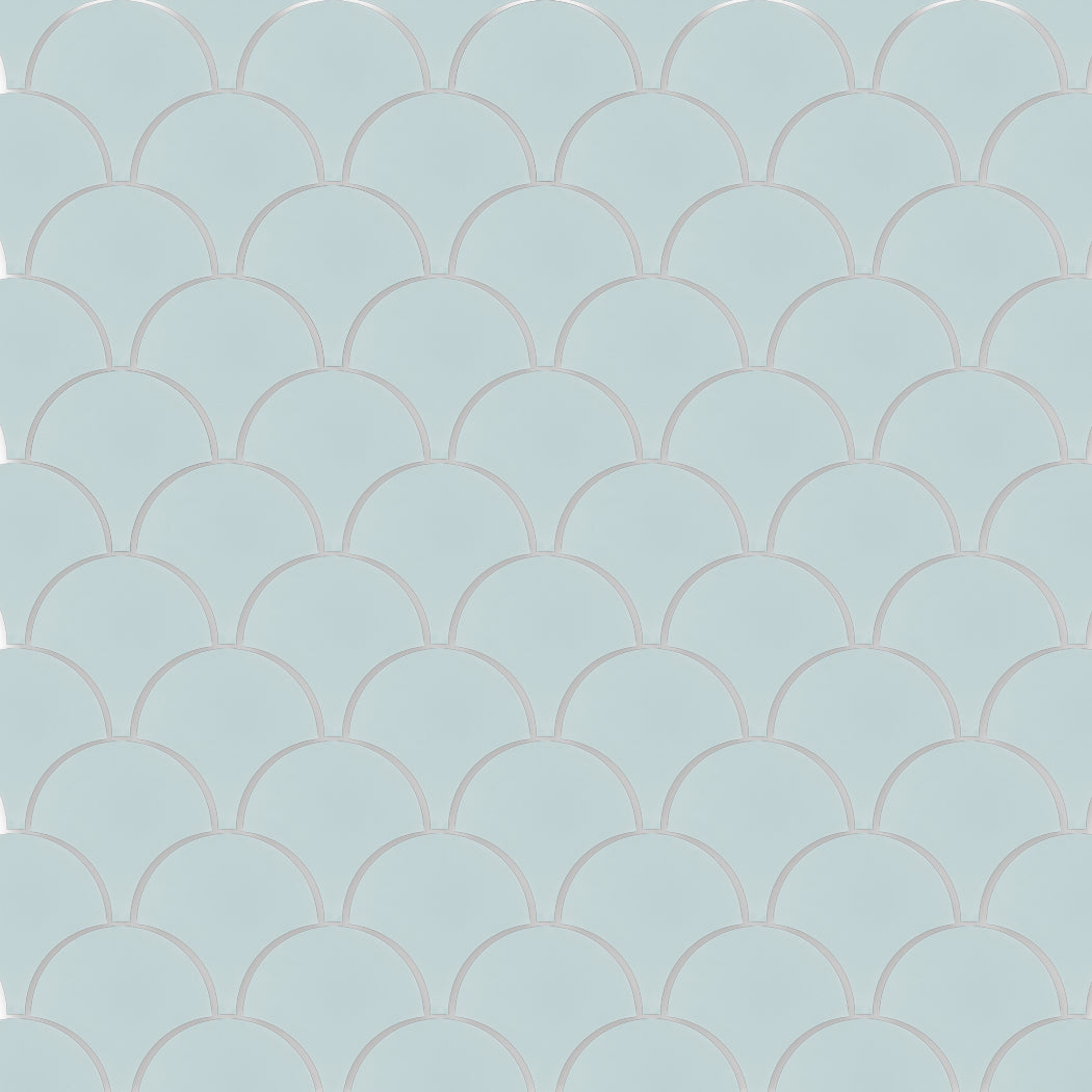 The NF20-440-Fishscale by New York Cement Tile features a light blue scallop pattern with thin white grout lines.