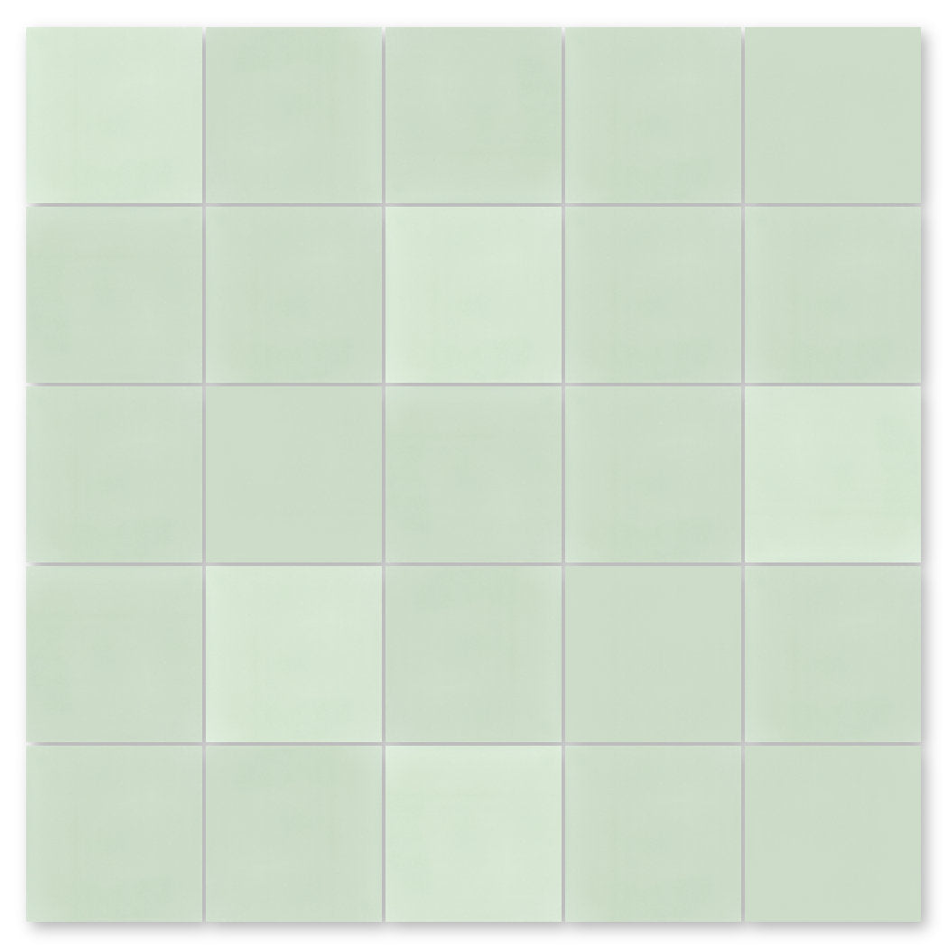 A 5x5 grid of New York Cement Tile 3300-Solid Light Green tiles with thin white grout lines.