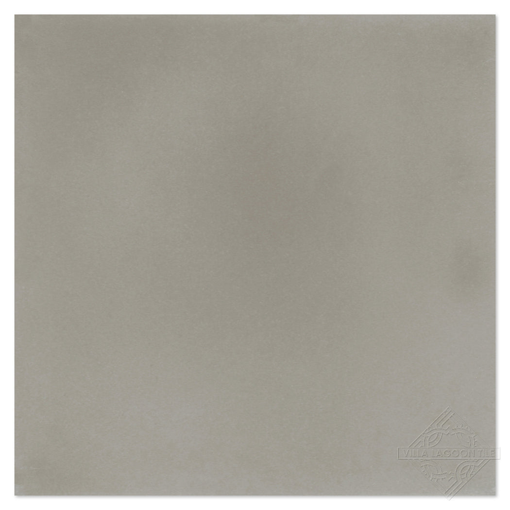 A light grey, smooth 2215-Solid Sample by New York Cement Tile with a subtle logo in the bottom right corner.