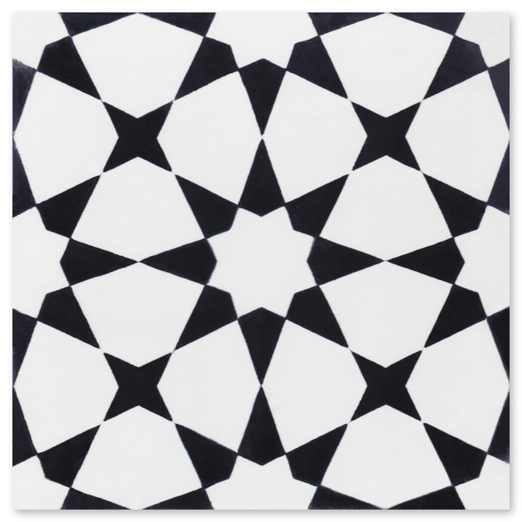 The N20-271 White & Black Extra Sample by New York Cement Tile features handcrafted stars and triangles in a bold geometric design.