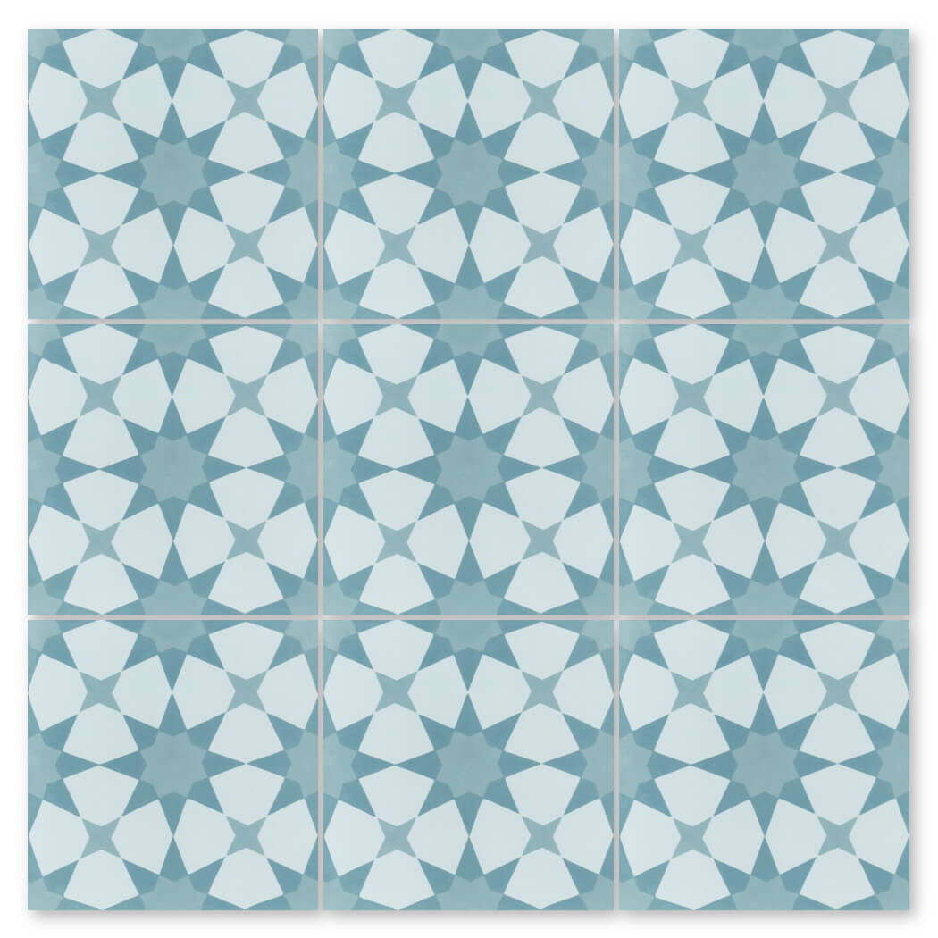 N20-271 Blue tile by New York Cement Tile: light blue & white, star and diamond patterns, durable flooring sample.
