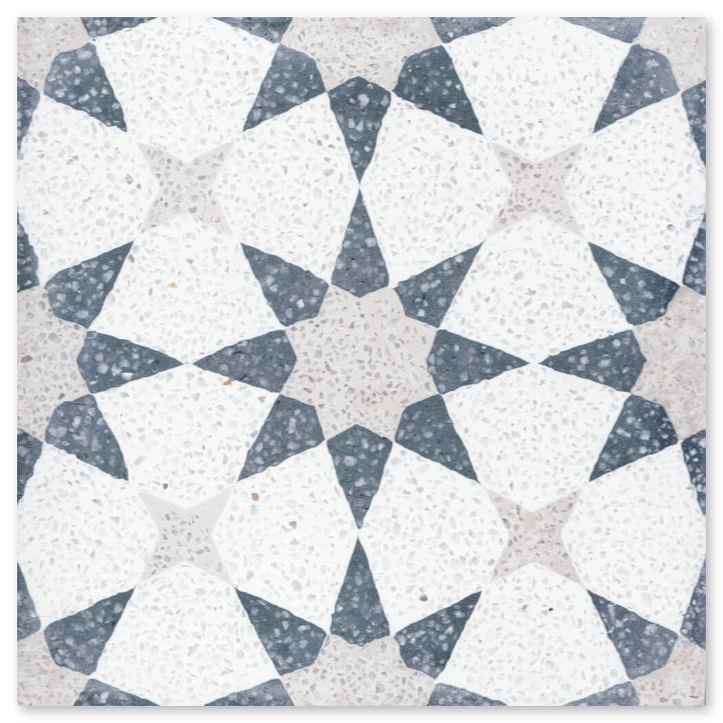 The NT20-271 Sample by New York Cement Tile features a symmetrical star-like pattern in white, gray, and speckled terrazzo.