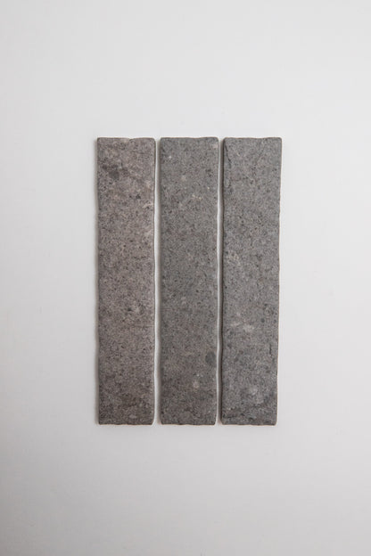 Three Toba Basilica R11 tiles by Toba arranged vertically on a plain white background.