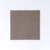 Three Toba Brun R11 crispbreads by New York Cement Tile, rectangular and dark brown, side by side on a white background.