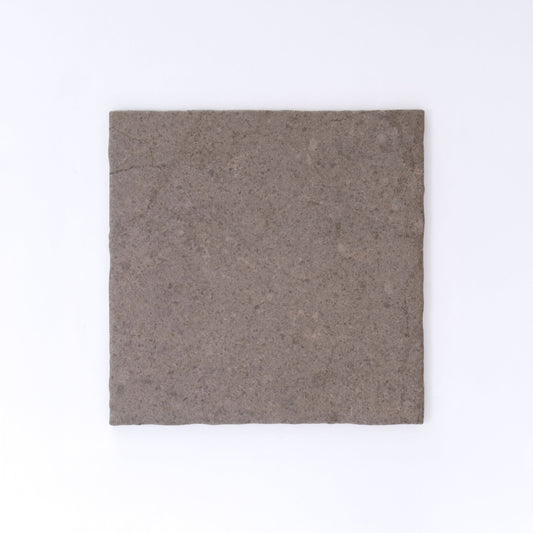 Three Toba Brun R11 crispbreads by New York Cement Tile, rectangular and dark brown, side by side on a white background.