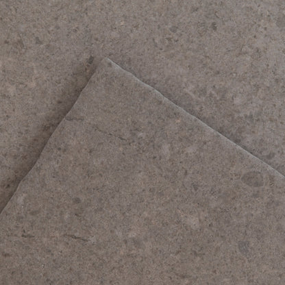 The Toba Brun R11 by New York Cement Tile: a single square gray stone tile on a plain white background.
