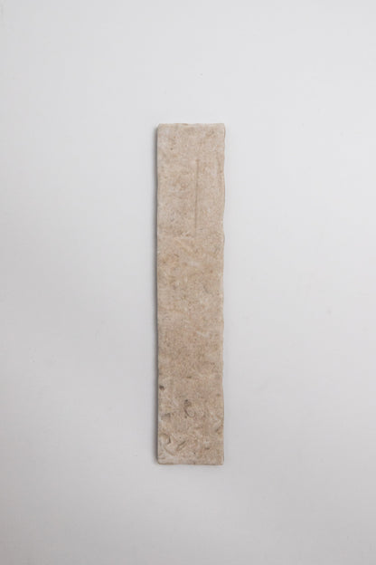 A single Toba Ivory R11 flatbread is centered on a plain white background.