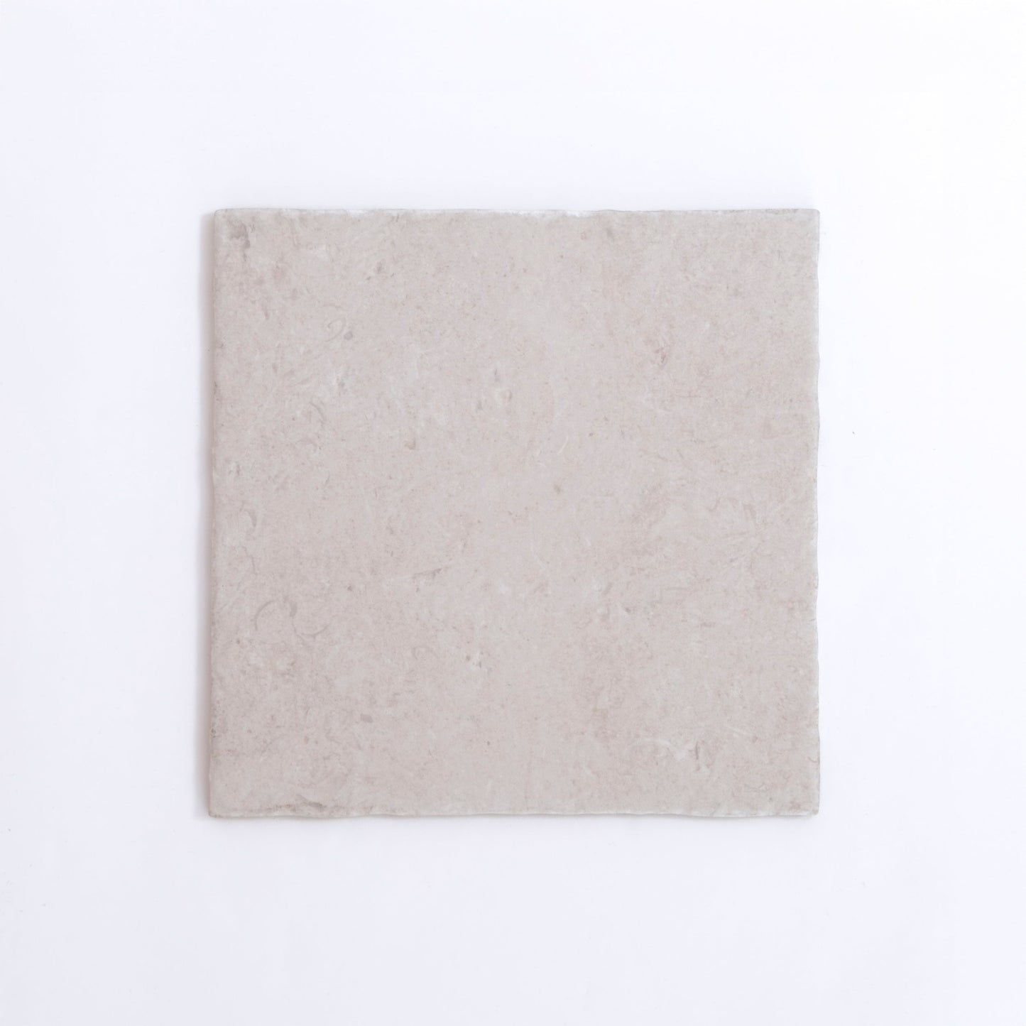 A single Toba Multicolor R11 tile by New York Cement Tile, featuring a subtle textured surface on white background.