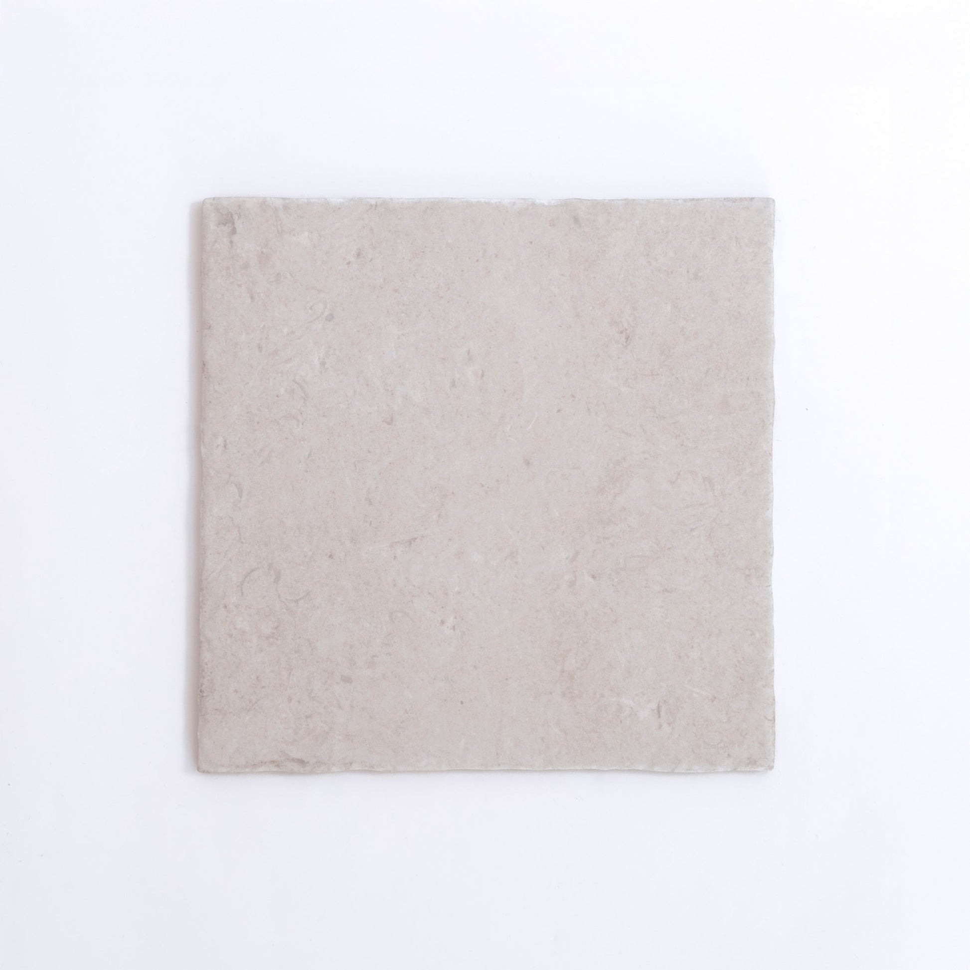 A single Toba Multicolor R11 tile by New York Cement Tile, featuring a subtle textured surface on white background.