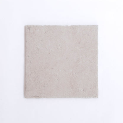 A single Toba Multicolor R11 tile by New York Cement Tile, featuring a subtle textured surface on white background.