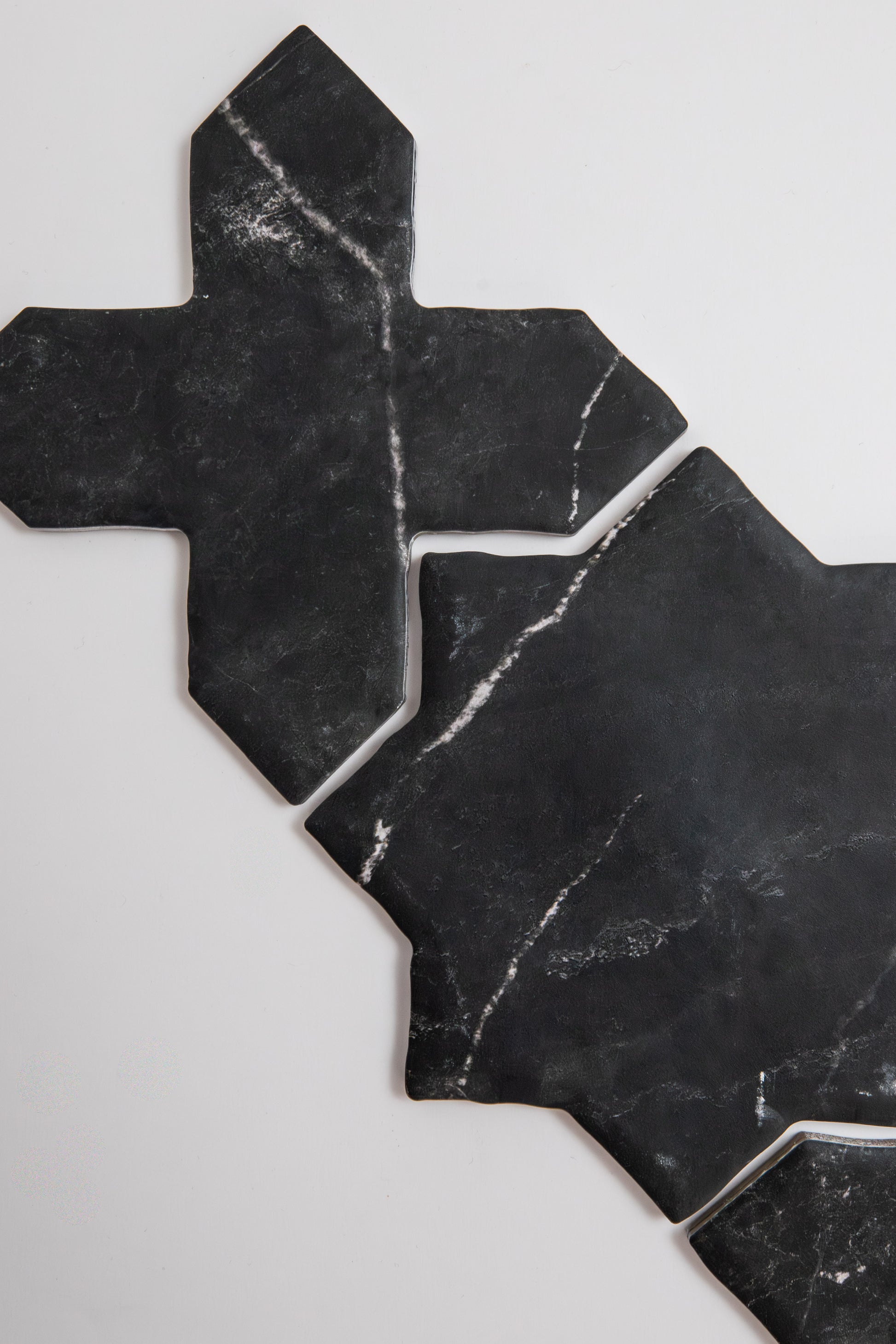Tosca Black Marble Cross-Star tile