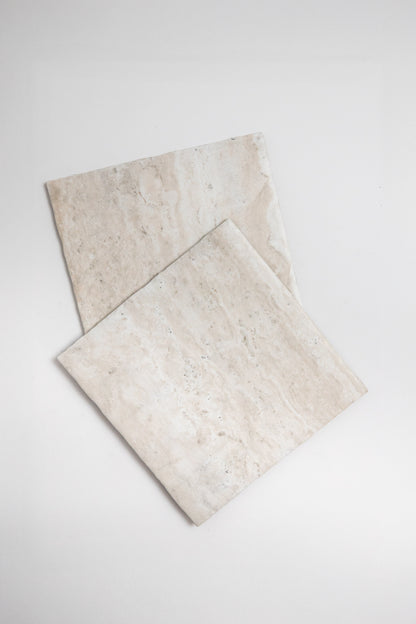Nine Travertine tiles by New York Cement Tile, arranged 3x3 on a plain white background.