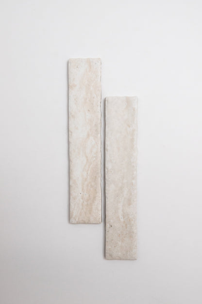 Two rectangular Tosca Travertine tiles shown vertically side by side on a plain white background.