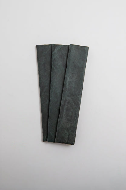 Three Verde Tia rectangular slabs by Tosca are arranged side by side on a plain white background.