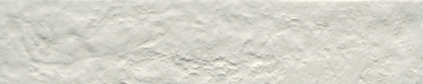 White - Brique - Sample by New York Cement Tile features a rough, plaster-like texture—perfect for a statement wall.
