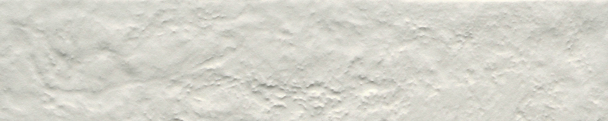 White - Brique - Sample by New York Cement Tile features a rough, plaster-like texture—perfect for a statement wall.
